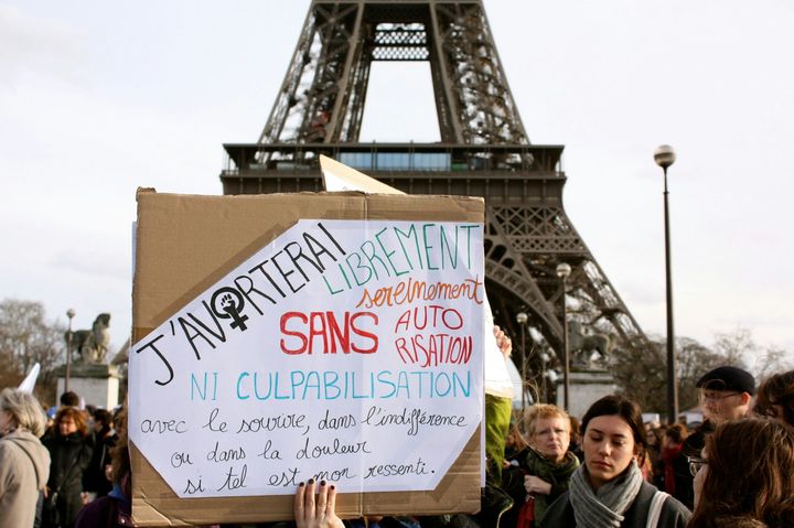 A feminist demonstration before the Eiffel Tower, Paris